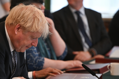 Behind-the-scenes photos reveal top Tories look utterly miserable in Cabinet meeting