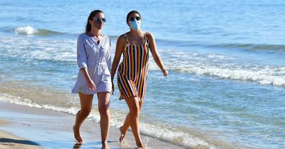 Spain holiday warning as officials say face masks could return as Covid cases spike