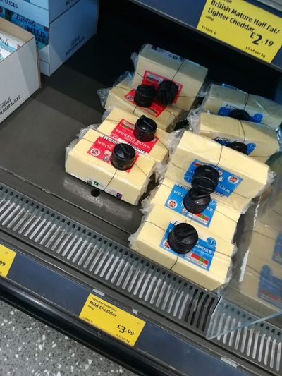 Supermarkets put security tags on cheese blocks as stores tackle shoplifting amid soaring food costs