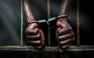 Handcuffing, a judicial tap, and the long arm of the law