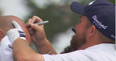 Shane Lowry leaves crowd in hysterics as he signs Rory's Stories head at JP McManus Pro-Am