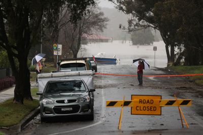 Thousands more evacuate homes in Sydney even as heavy rains ease