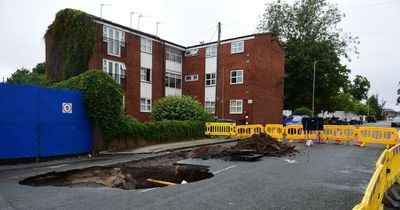 Roads remain closed as 10ft sinkhole opens up