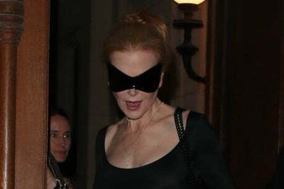 Nicole Kidman channels Catwoman as she steps out in sunglasses at Paris Fashion Week