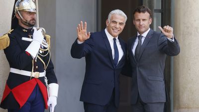 Lapid talks with Macron about Iran, Lebanon on Israeli PM's first foreign trip