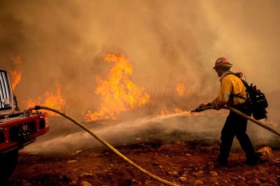 Favorable weather helps fight against California forest fire