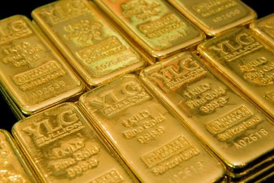 Gold prices tumble as dollar gains against euro