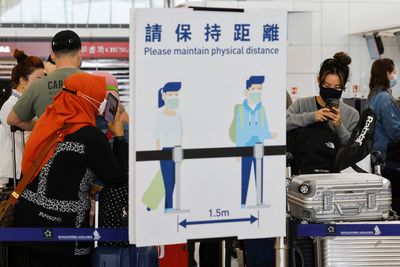 Hong Kong suspends flight bans as it eases COVID rules
