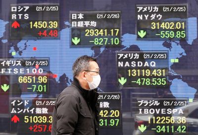 Asian stocks higher after US Fed signals more rate hikes