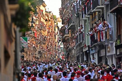 1st bull run in Pamplona in 3 years takes place; no gorings