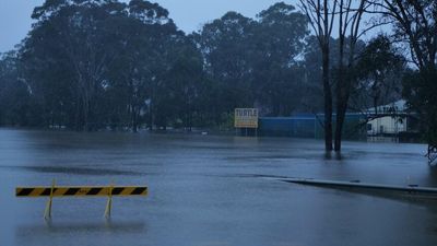 Western Sydney residents urged to use less water as rain eases, flooding subsides