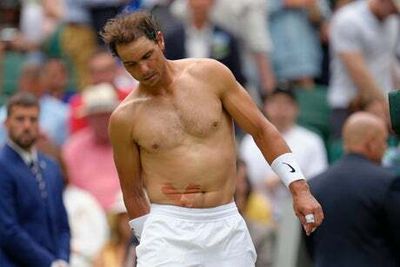 Rafael Nadal shows stomach for Wimbledon fight but injury may curtail final push