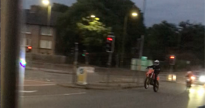 Reckless Edinburgh motorbike yobs pull stunts and run red light in chilling video