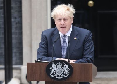 Who turned up to support Boris Johnson as he quit as prime minister?