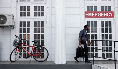 Sri Lankans ditch cars for bicycles to ride out economic crisis