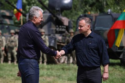 Poland, Lithuania leaders meet troops at NATO bottleneck