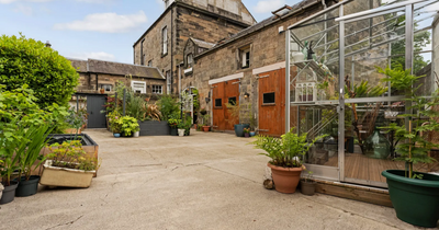 Stunning Edinburgh rustic cottage hidden behind walled garden hits the market