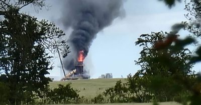 Dozens of firefighters battling inferno at Scots factory as flames seen for miles