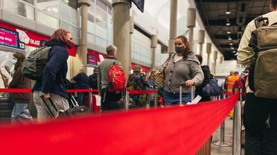 Flight delays cause havoc at Brisbane Airport with 50,000 passengers expected through terminal