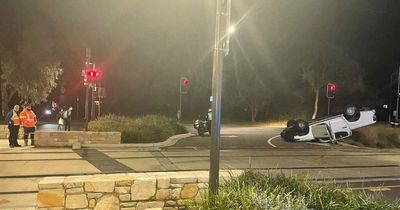 Alleged drink driver flips car after hitting tram