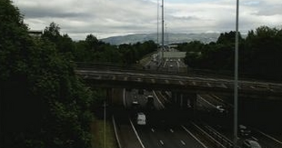 Banned driver on M8 motorway hits car causing it to lose control and plough into central reservation