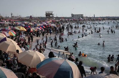 ‘The sea is more blue’: Gazans head to the beach after sewage cleanup