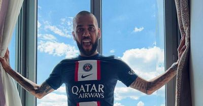 Dani Alves confuses fans by posing in PSG shirt after leaving Barcelona for second time