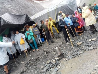 Thirteen dead, three dozen missing after cloudburst in India's Kashmir