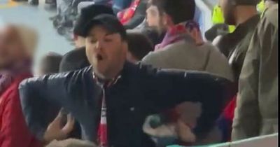 Yob caught making 'disgusting' monkey gestures at Manchester United fans escapes football ban