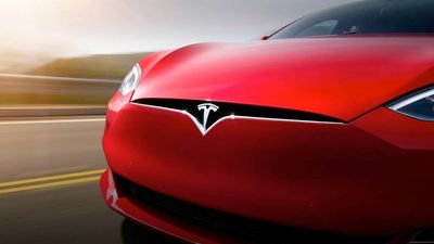 Tesla Stock: Charging Higher or Short-Circuit?