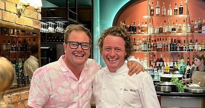Alan Carr snapped at Edinburgh's new Tom Kitchin restaurant enjoying meal ahead of shows