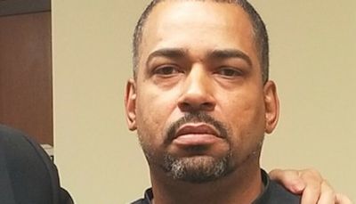 Judge overturns murder conviction of man who said he was framed by disgraced former detective