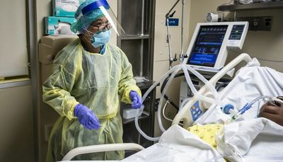 COVID-19 filling hospital beds across Illinois, as risk level improves to ‘medium’ in Cook County