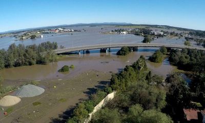 NSW floods: government names recovery coordinators as rain and big surf set to return