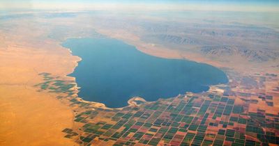 Idyllic lake resort now nightmarish town filled with toxic air and deadly dust