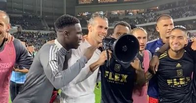 Gareth Bale touches down in LA and leads on-pitch celebrations with megaphone as Spanish press take fresh swipe at him