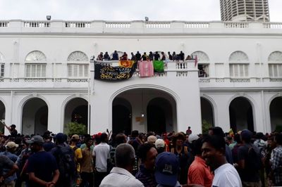 Sri Lanka protesters set prime minister's home alight, president flees