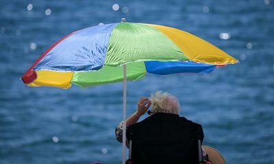 UK weather: stay out of the sun, doctors warn, as Britain braces for its hottest day