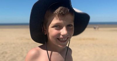 Boy returns to beach after horror incident left him disfigured