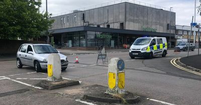 Police cordon in place after car left awaiting recovery in middle of road