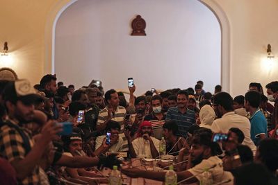 Sri Lanka protesters staying put until president, PM leave office