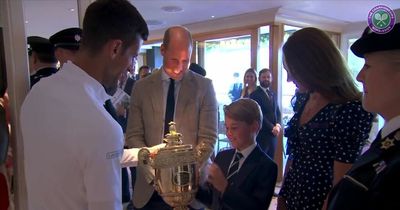 Adorable moment Prince George holds Wimbledon trophy as anxious Kate grabs lid