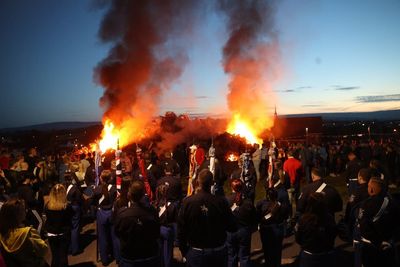 Vigil held for bonfire builder killed in fall