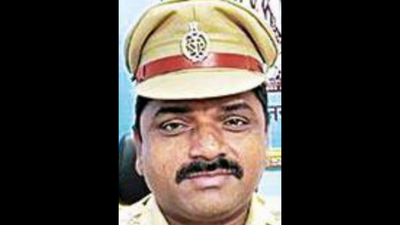 Suspended Hyderabad cop accused of rape surrenders