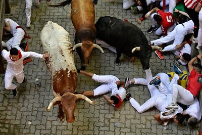 Spain: Three runners gored in tense 5th Pamplona bull run