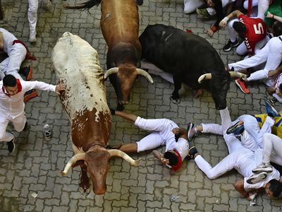 Three runners are gored in a tense 5th Pamplona bull run