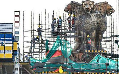 PM Modi unveils national emblem on new Parliament building