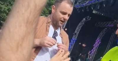 TRNSMT reveller gets down on one knee to propose to girlfriend as delighted crowd cheers him on