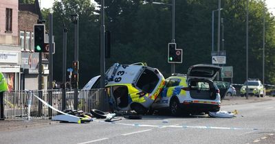 Officers pulled from wreckage by witnesses after police car crash