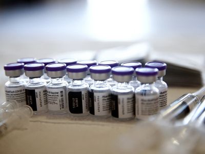 1.1 billion Covid vaccine doses wasted globally, estimates suggest